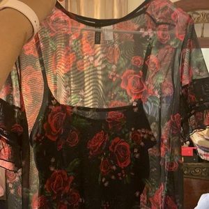 Two piece dress, outer garment is sheer.  Like new